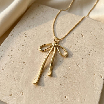 Gold-Tone Ribbon Bow Necklace — product view