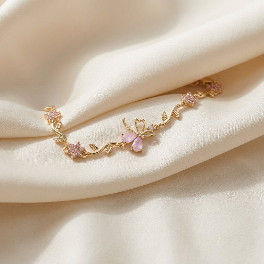 Gold-Tone Pink Butterfly Vine Bracelet — detail view