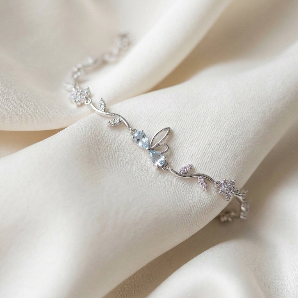 Silver-Tone Icy Blue Butterfly Vine Bracelet — detail view